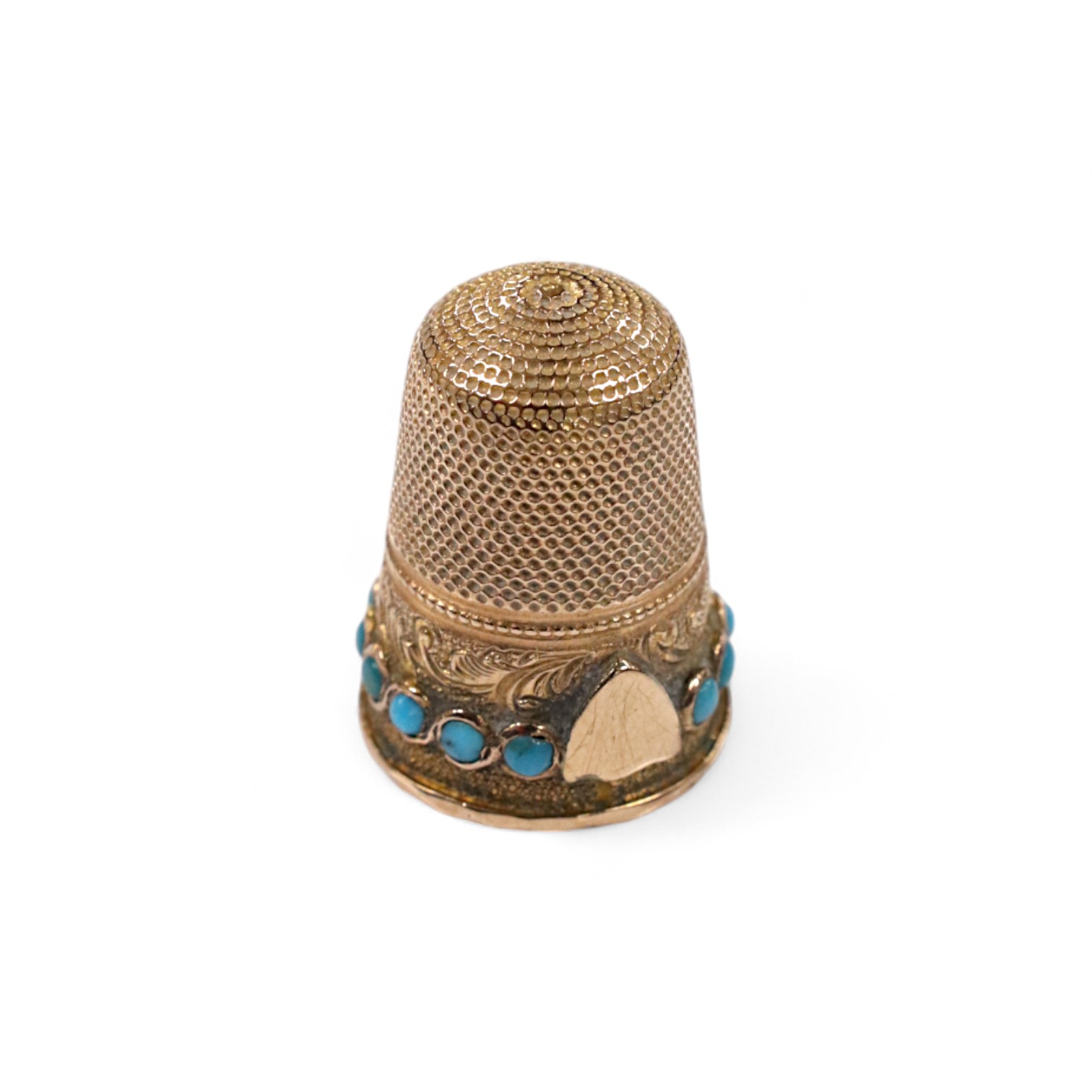 An antique yellow metal and turquoise set thimble, (stone missing), 21mm, gross weight 4,5 grams. Condition - poor to fair